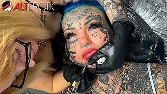 A Stunning Tattooed Woman Receives Additional Facial Ink In This Video